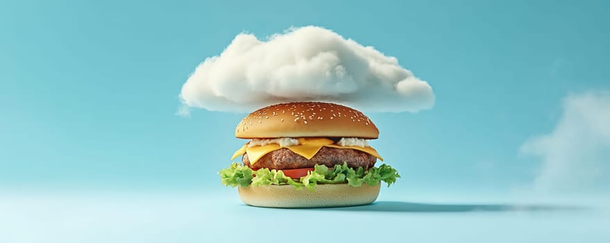 Cheeseburger with cloud on blue background, surreal concept.
