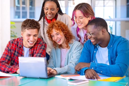 Group of students, meet on university campus work together on creative tasks, prepare for university exams, use laptop. Education, study of university life concept.