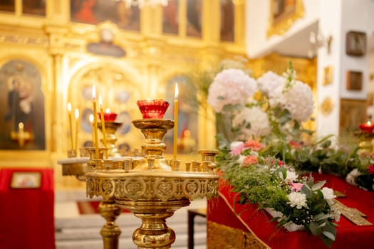 Soft Focus Candles Illuminate Background Of Orthodox Church
