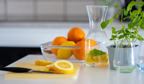 Preparing Homemade Lemonade From Lemons And Oranges Is A Refreshing Activity