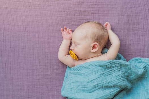 The baby is sleeping peacefully in his cozy nest. Newborn photo session captures the serene innocence and warmth of early moments.