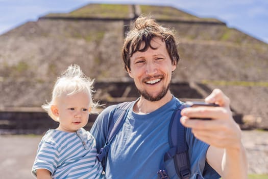 Father and son tourists exploring Teotihuacan, Mexico. Cultural heritage, ancient ruins, and archaeological adventure concept.