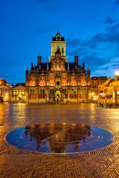 Delft City Hall and Delft Market Square Markt in the evening. Delft, Netherlands