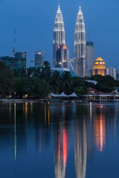 KUALA LUMPUR, MALAYSIA - JUNE 19: Petronas Twin Towers in twilight on June 19, 2011 in Kuala Lumpur. They were the tallest building in the world 1998-2004 and remain the tallest twin building
