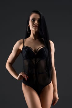 Gorgeous fitness model in sexy silk body full-length shot