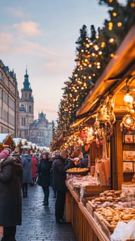 Tourists enjoying christmas spirit at traditional european market in prague