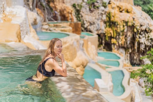 Female tourist at the hot springs of Grutas Tolantongo, Mexico. Adventure, relaxation, and natural wellness concept.
