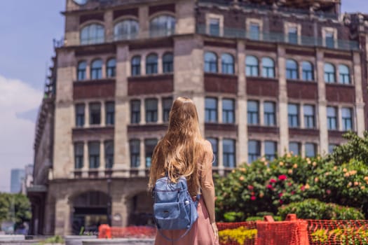 Female tourist in the central square of Mexico City, Zocalo. Cultural exploration, travel, and historic architecture concept.