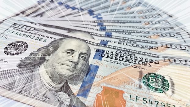 A Fan of $100 Bills.A close-up photo of a fan of $100 US dollar bills. The bills are arranged neatly, with the portrait of Benjamin Franklin visible on each bill. The background is white.Finance ve economy concept.