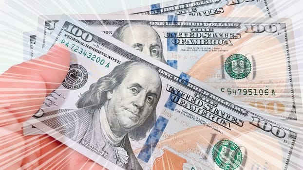 A Fan of $100 Bills.A close-up photo of a fan of $100 US dollar bills. The bills are arranged neatly, with the portrait of Benjamin Franklin visible on each bill. The background is white.Finance ve economy concept.