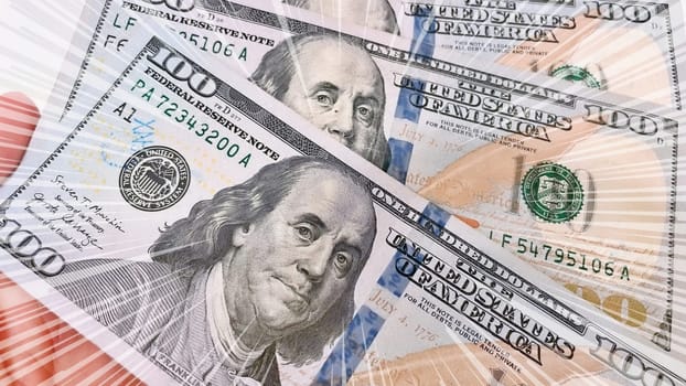 A Fan of $100 Bills.A close-up photo of a fan of $100 US dollar bills. The bills are arranged neatly, with the portrait of Benjamin Franklin visible on each bill. The background is white.Finance ve economy concept.