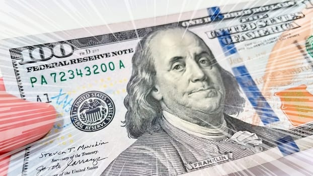 A Fan of $100 Bills.A close-up photo of a fan of $100 US dollar bills. The bills are arranged neatly, with the portrait of Benjamin Franklin visible on each bill. The background is white.Finance ve economy concept.