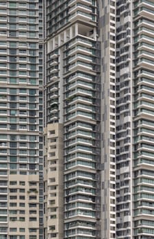 Bangkok, Thailand - 17 Oct, 2024 - Architectural exterior of condominium building facade. Frame and glass windows architecture, Space for text, Selective focus.