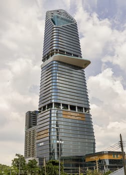 Bangkok, Thailand - 17 Oct, 2024 - Architecture exterior of KingBridge tower with sky background in the city of Bangkok at afternoon. Space for text, Selective focus.