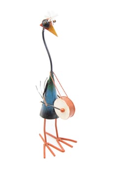 A delightful and charming handcrafted bird figure playing a drum, ideal for both decor and artistic displays