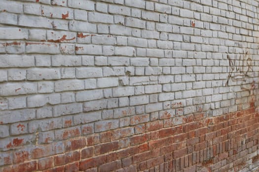 old brick wall, red and white colour, broken bricks, peeling plaster, vintage texture, background for banner, copy space