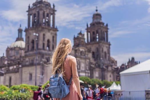 Female tourist in front of Catedral Metropolitana de la Ciudad de Mexico. Cultural exploration, historic architecture, and travel experience concept.