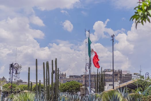 Mexican flag in the central square of Mexico City, Zocalo. National pride, cultural heritage, and iconic landmark concept.