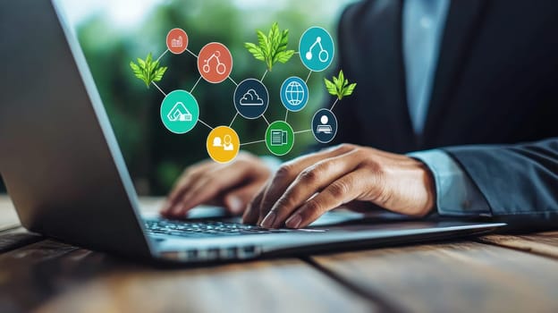 businessman is using laptop to explore various digital icons representing technology and sustainability. image conveys sense of innovation and connection in modern workspace.
