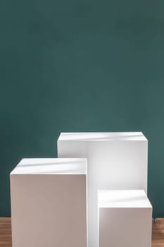 Product photography mockup. White bases against green background. High quality photo