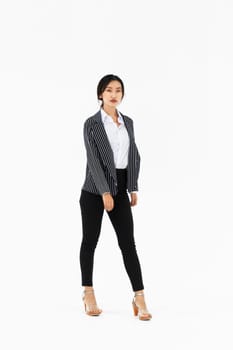 Asian woman full body portrait on white background wearing formal business suit . Jivy