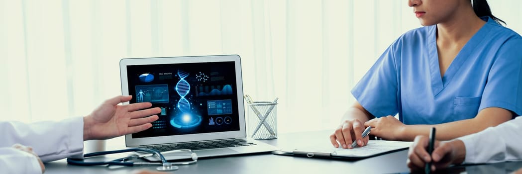 Group of doctor or researcher studying genetic disease in DNA with laptop, analyze genetic data, formulate medical treatment strategies, and develop healthcare plan with innovative solution. Neoteric