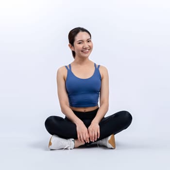 Full body asian woman in sportswear portrait, smiling and posing cheerful gesture. Workout training with attractive girl engage in her pursuit of healthy lifestyle. Isolated background Vigorous