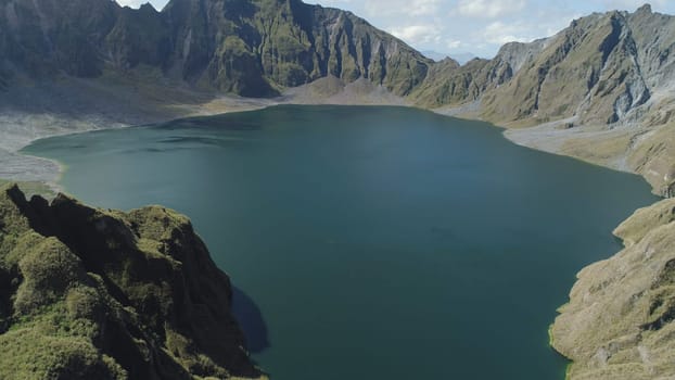 Crater lake of the volcano Pinatubo among the mountains, Philippines, Luzon. Aerial view beautiful landscape at Pinatubo mountain crater lake. Travel concept