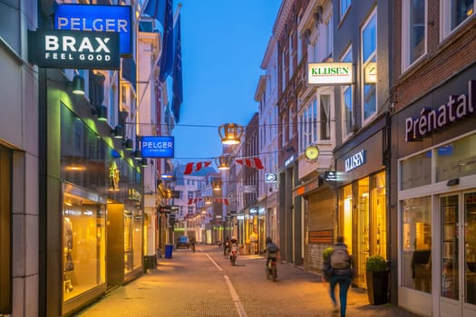 Hague, Netherlands - December 1, 2017: The city center of Den Haag shopping street area in downtown of Hague, Netherlands at night