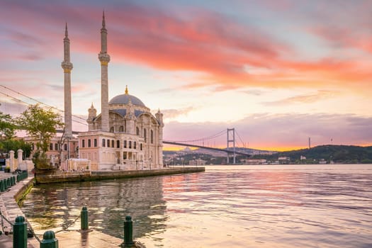 Ortakoy mosque on the shore of Bosphorus in Istanbul, Turkey at sunset