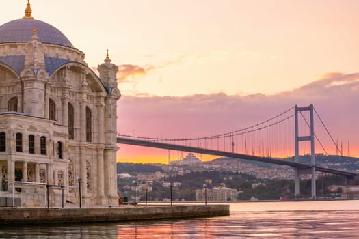 Ortakoy mosque on the shore of Bosphorus in Istanbul, Turkey at sunset
