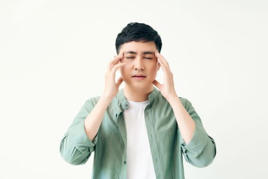 man feel headache with white background, asian