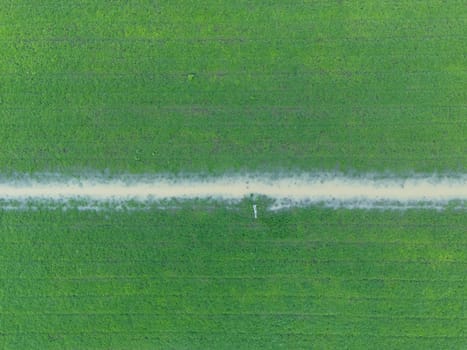 Overhead Aerial view of a flooded fields showcasing the impact of unusual heavy rainfall on rural landscapes during autumn