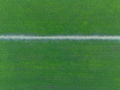Overhead Aerial view of a flooded fields showcasing the impact of unusual heavy rainfall on rural landscapes during autumn