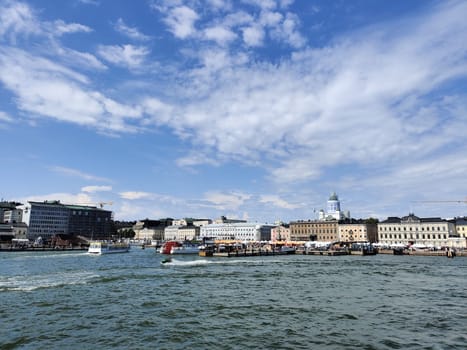 Helsinki, Finland - July 25 2024: City centre of Helsinki, capital of Republic of Finland, view from the sea in summer day