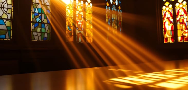 Golden sunlight streams through stained glass windows, casting long, dramatic shadows across the floor. The warm light illuminates the intricate patterns of the glass, creating a mesmerizing dance of light and shadow. The scene evokes a sense of serenity and awe, inviting contemplation in the tranquil space.