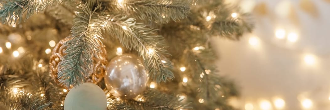Christmas balls in close-up on the Christmas tree. Decorations for Christmas trees. The concept of celebrating New Year and Christmas