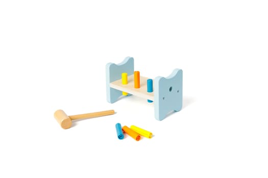 Wooden education toy for motor skills development isolated on white background.