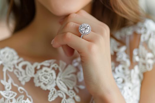 Elegant woman s hand adorned with diamond ring on white background, copy space available