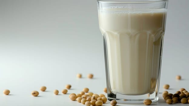 A Glass of Refreshing Soy Milk Surrounded by Scattered Soybeans, Healthy Vegan Beverage