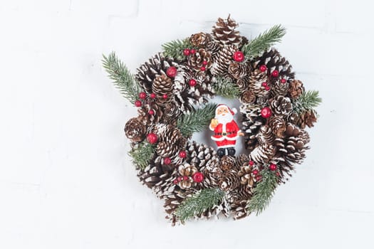 Elegant christmas wreath decorated pine cones and fir trees. Christmas mood