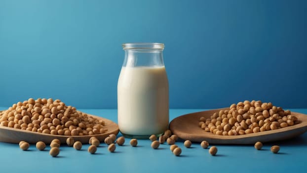 Glass Bottle of Creamy Soy Milk Surrounded by Nutritious Soy Beans on a Vibrant Blue Background.