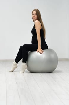 care woman pregnancy fit maternity healthy ball pregnant workout female fitness exercise