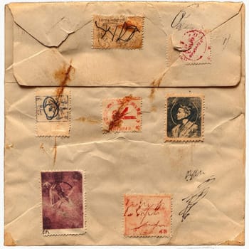 An old envelope adorned with vintage stamps from different countries, displaying various designs, postmarks, and inscriptions, symbolizing global communication.