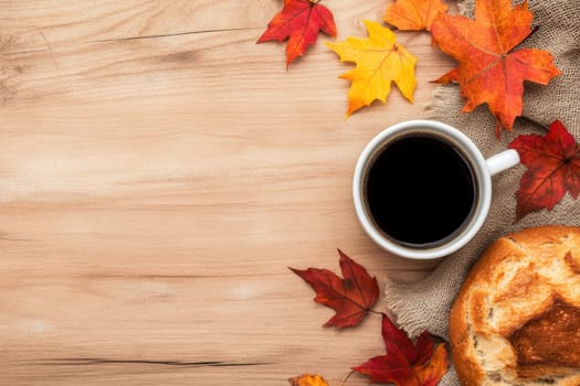 bread and coffee placed on a wooden surface , maple leaves autumn decoration, bakery scene..