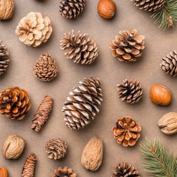 Various pine cones and nuts are beautifully arranged on a brown background, highlighting their unique shapes and textures, perfect for autumn decoration or nature study.