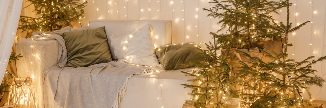 Interior bedrooms in Scandinavian style, decorated for the Christmas holidays. Live ate in the interior