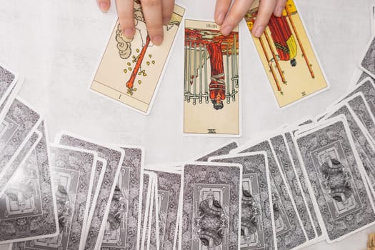 TVER, RUSSIA - FEBRUARY 18, 2024. Tarot cards, Tarot card divination, fortune telling. Occultism, esoteric education