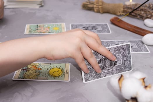 TVER, RUSSIA - FEBRUARY 18, 2024. Tarot cards, Tarot card divination, fortune telling. Occultism, esoteric education