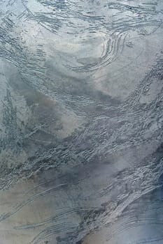 Gray texture of decorative Venetian plaster close-up